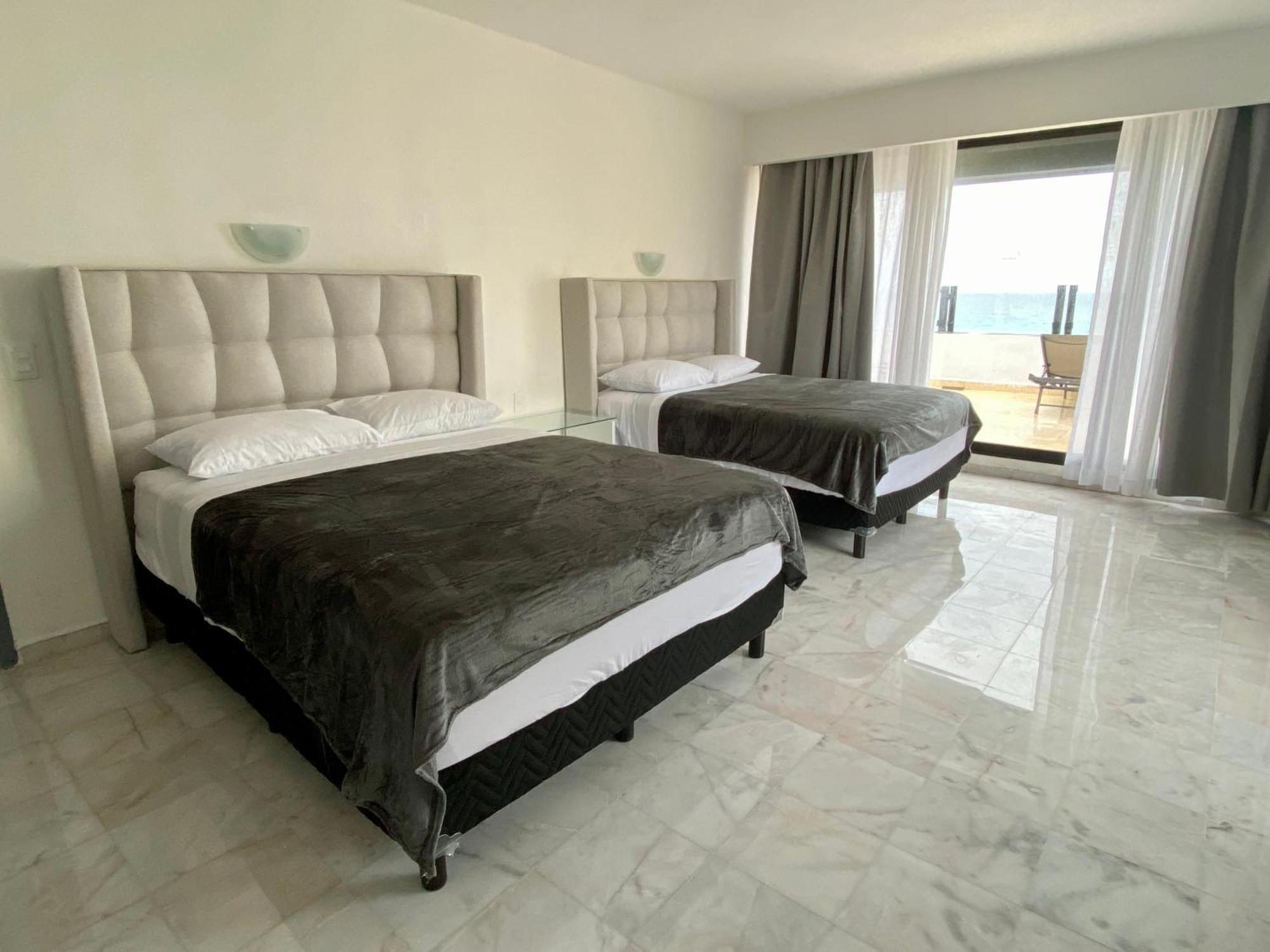 Condo In Ocean Front Resort Cancún Habitación foto