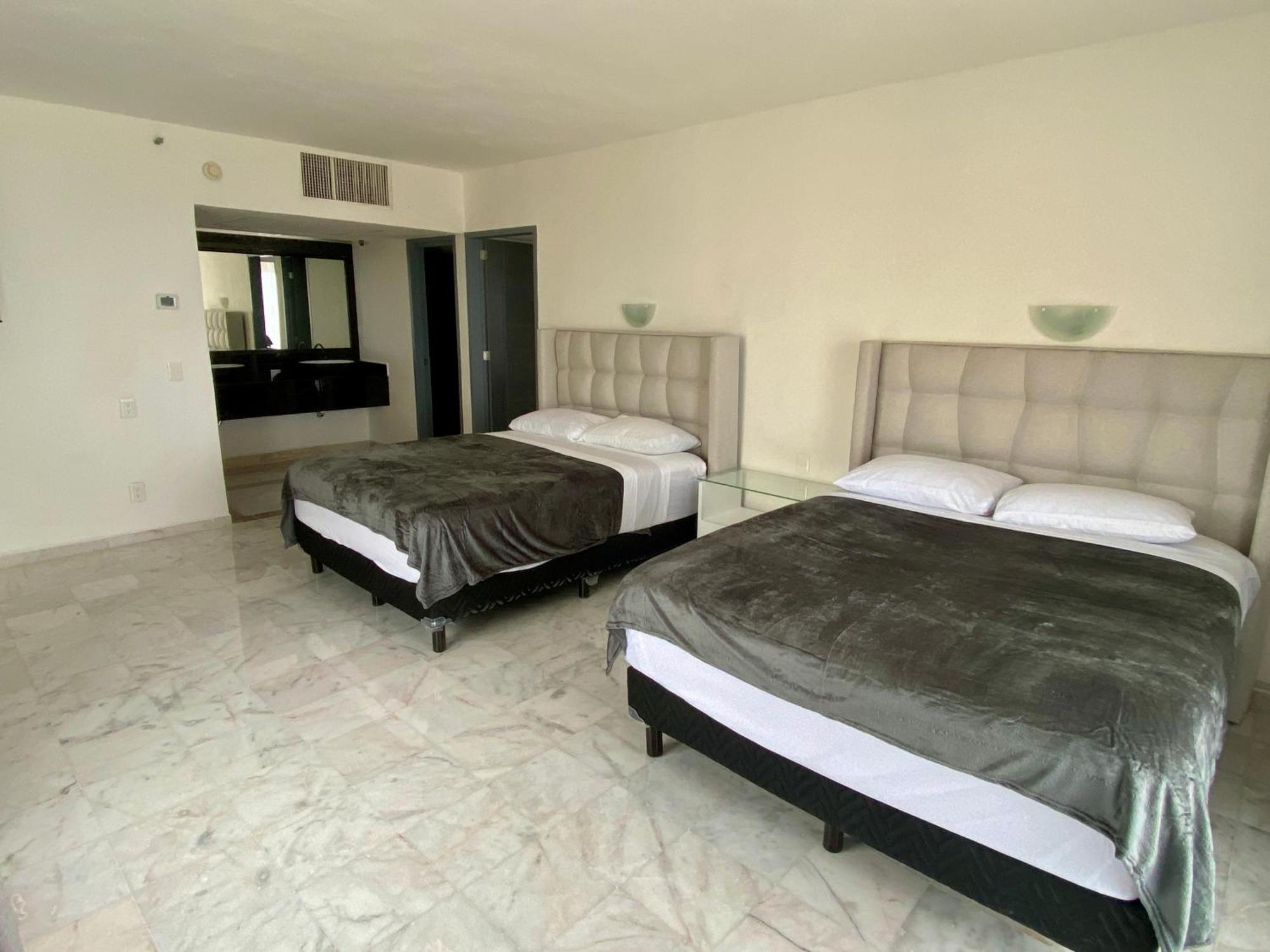 Condo In Ocean Front Resort Cancún Habitación foto